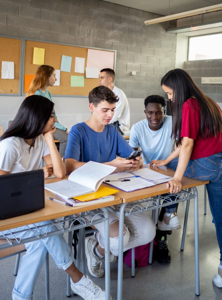 group-of-multi-ethnic-students-talking-in-class-du-2024-12-03-02-45-39-utc